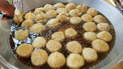 Frying meatballs Stock Footage 316579661