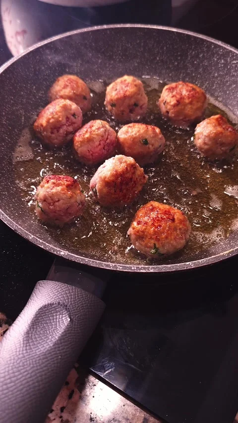 Frying meatballs at home. Stock Footage 345041418