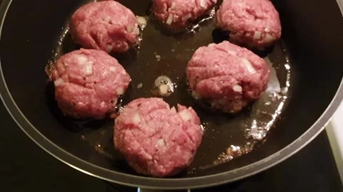 Frying meatballs in a pan Stock Footage 155129205