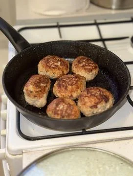 Frying Meatballs in Pan Stock Photos