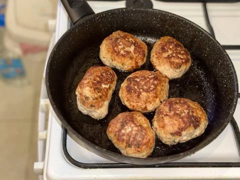 Frying Meatballs in Pan 写真素材