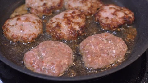 Frying meatballs in pan slow motion food Video stock 114078214
