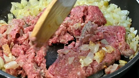 Frying minced beef with onion Stock Footage 219878650