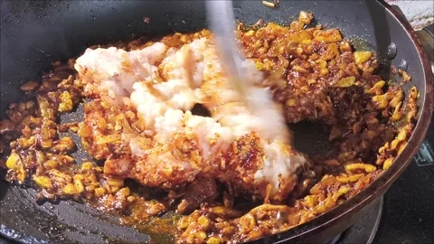 Frying minced chicken with sauce in pan, in door  Chiangmai  Thailand. Stock Footage 301275516