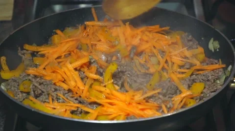 Frying minced meat on a Teflon pan Stock Footage 46369610