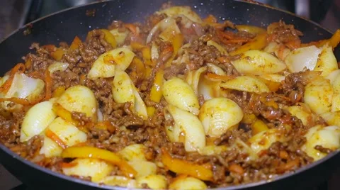 Frying minced meat on a Teflon pan Stock Footage 46369647