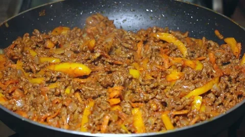 Frying minced meat on a Teflon pan Stock Footage 46369680