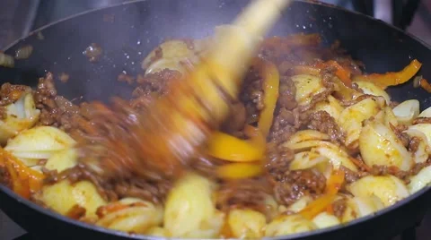 Frying minced meat on a Teflon pan Stock Footage 46369690