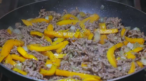 Frying minced meat on a Teflon pan Stock Footage 46369696