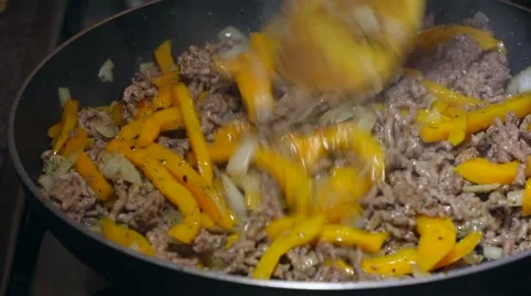 Frying minced meat on a Teflon pan Stock Footage 46369836
