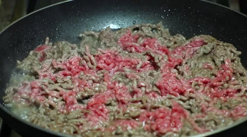 Frying minced meat on a Teflon pan Stock Footage 46369854