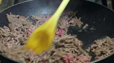 Frying minced meat on a Teflon pan Stock Footage 46369970