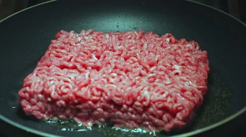 Frying minced meat on a Teflon pan Stock Footage 46370077