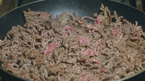 Frying minced meat on a Teflon pan Stock Footage 46370114