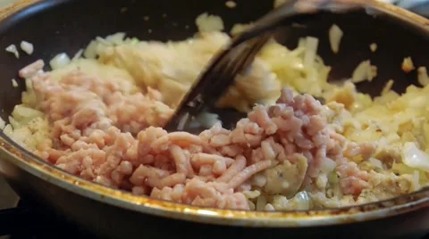 Frying minced pork on a Teflon pan Stock Footage 50311302