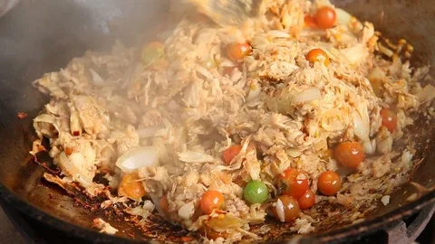 Frying minced young jackfruit  with pork and tomato in pan , Thai northern food Stock Footage 105345812