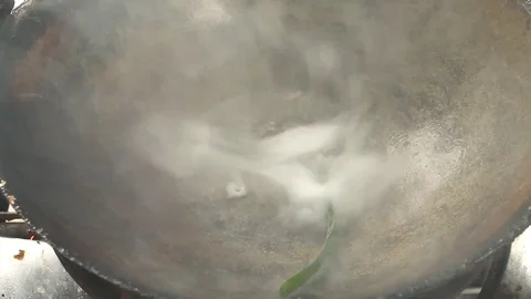 Frying  morning glory or Pad Pukbung  in pan , Chiangmai  Thailand Stock Footage 90028704