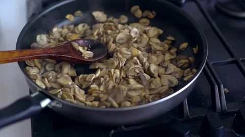 Frying mushrooms Stock Footage 73753164