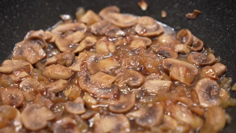 Frying mushrooms. Stock Footage 253521570