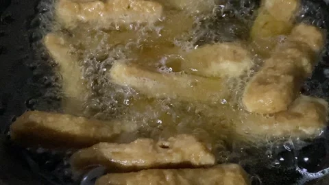 Frying nuggets Stock Footage 263887063