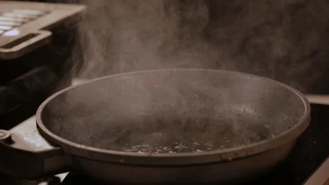 Frying Oil Burning On The Kitchen Stove. A Safety Hazard In The Kitchen. Stock Footage 313130942