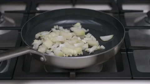 Frying an onion Stock Footage 147992809