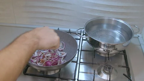 Frying onions Stock Footage 145648540