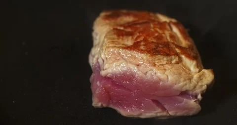Frying or baking meat Stock Footage 96064875