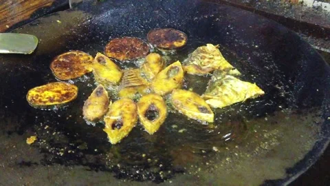 Frying Padma Ilish Fish at Mawa Ghat Bangladesh Stock Footage 174602078