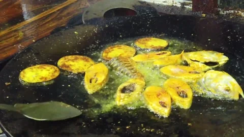 Frying Padma Ilish Fish at Mawa Ghat Bangladesh Stock Footage 174603581