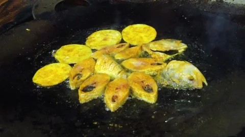 Frying Padma Ilish Fish at Mawa Ghat Bangladesh Stock Footage 174609632