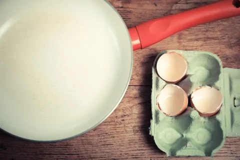 Frying pan and eggs 스톡 사진