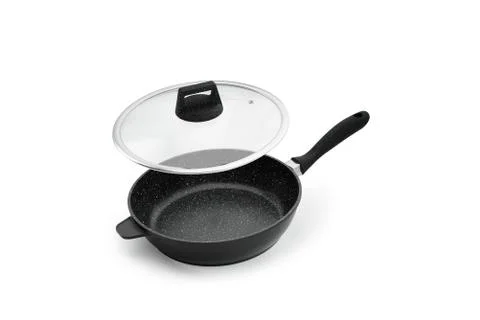 A frying pan with a black plastic handle; a glass lid; isolate against a whit 스톡 사진