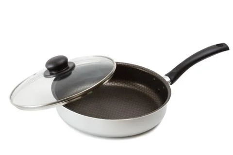 Frying pan with ceramic isolated on white background Foto stock