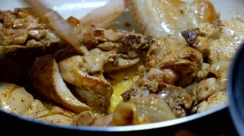 Frying pan chicken Stock Footage 62983900