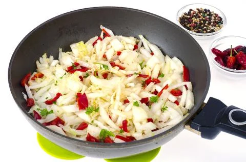 Frying pan with chopped cabbage, vegetable dishes Stock Photos