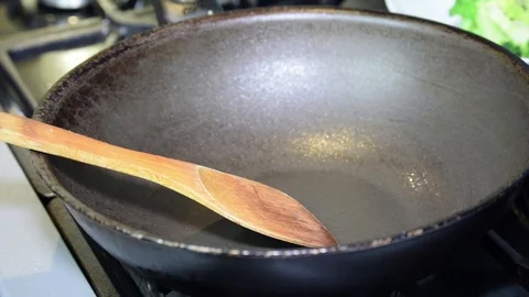Frying pan cooking wok squid Stock Footage 93646529