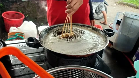 Frying pan is a device for cooking Stock Footage 232986008