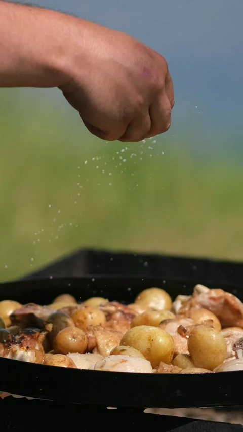 Frying pan from disc harrow with a lid for cooking over an open fire. The c.. Stock-Footage 291952106