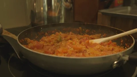 Frying Pan Filled With Tomatoes and Other Vegetables Stock Footage 121288201