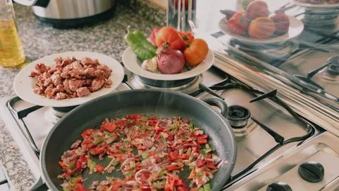 Frying pan on the fire Stock Photos