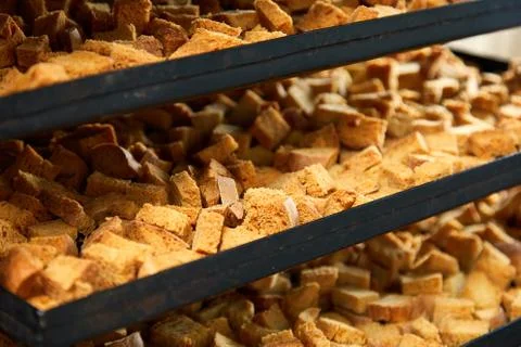 Frying pan with fresh bread rusks Stock Photos