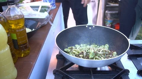 Frying Pan With Fresh Octopus And Veggies Cooking Stock Footage 105832718