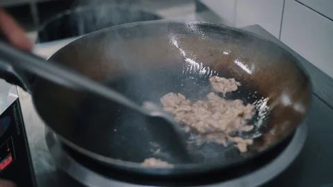 In a frying pan fried meat Stock Footage 112587718