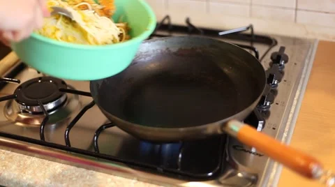In a frying pan fried noodles Stock Footage 47793869