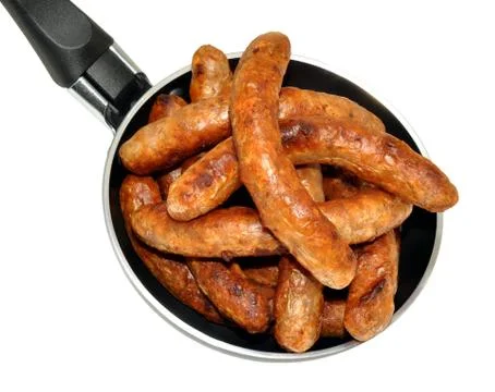 Frying Pan Full Of Sausages Stock Photos
