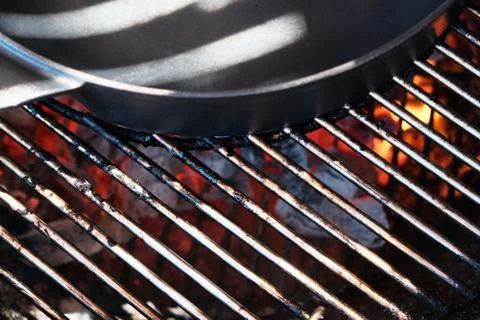 Frying pan on the grill Stock Photos
