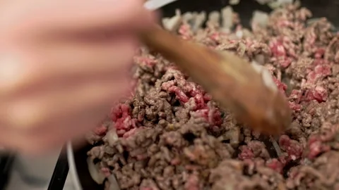 Frying in pan ground beef with onions and spices. Stock Footage 135461468