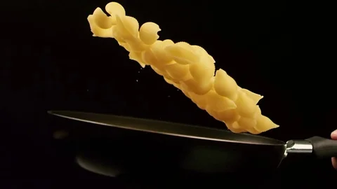 Frying Pan with Macaroni Stock Footage 74700420
