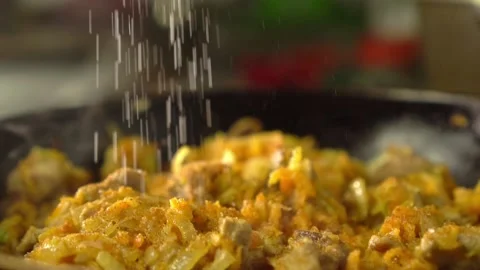 Frying pan with meat and vegetables close-up. Video stock 191634643
